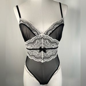 Victorias Secret Black and White Onesie With Lace